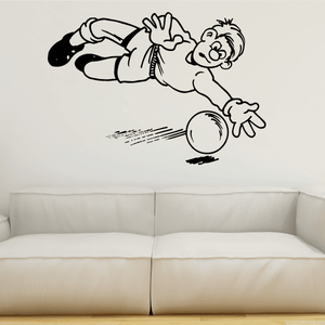 Vinyl soccer wall decal of cartoon player kicking a ball, black and white