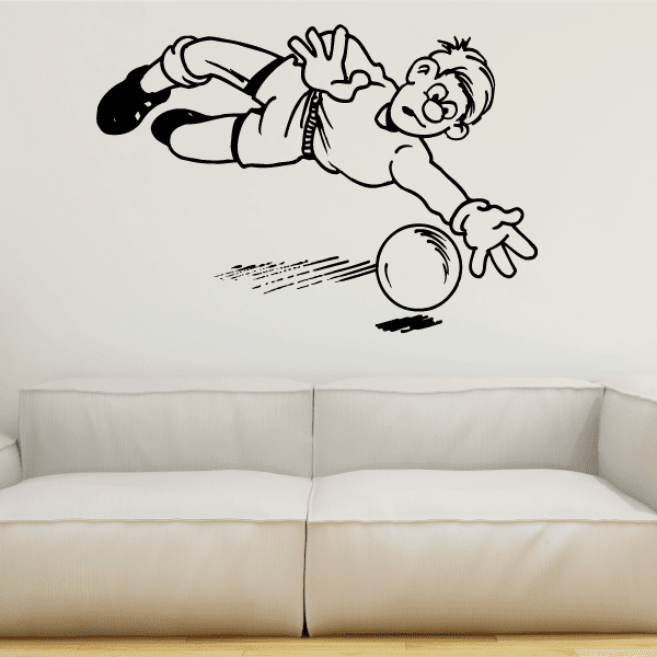 Vinyl soccer wall decal of cartoon player kicking a ball, black and white