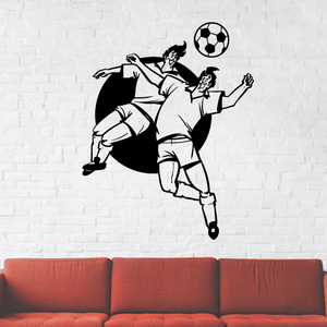 Soccer wall decal of a black player kicking a soccer ball