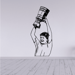 Soccer player wall decal vinyl figure with raised arms and ball above head