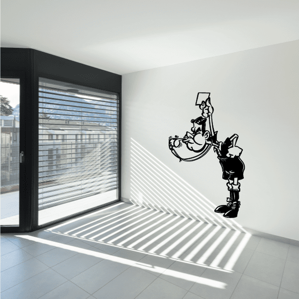 Black soccer player vinyl wall decal, cartoon figure holding a ball
