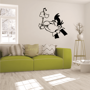 Vinyl soccer wall decal of black cartoon player kicking a ball