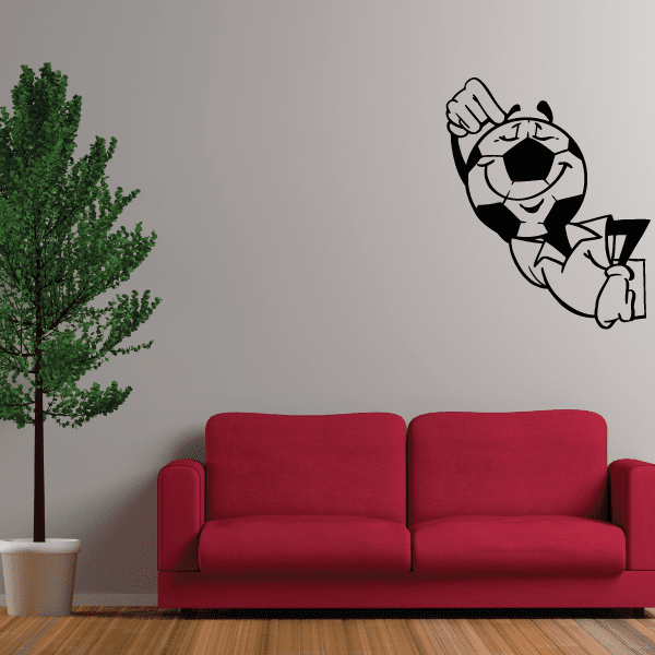 Black-and-white soccer player wall decal holding a soccer ball