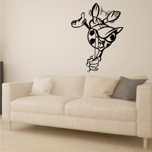 Soccer wall decal vinyl of a black-and-white cartoon soccer player kicking a ball