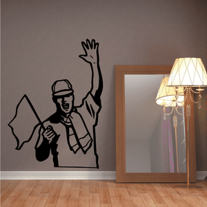 Black vinyl soccer wall decal with a player raising one arm and holding a ball