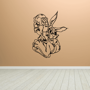 Soccer wall decal: cartoon soccer player holding a ball, outlined in black.