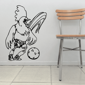Soccer wall decal featuring a black player outline kicking a soccer ball