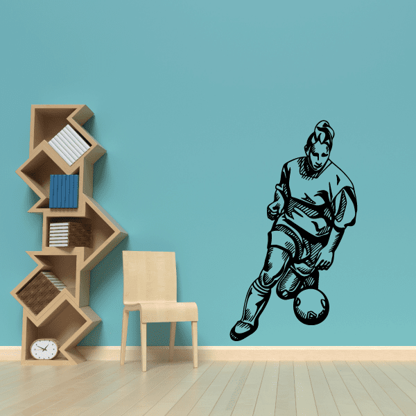Soccer wall decal vinyl sticker of a black soccer player kicking a ball