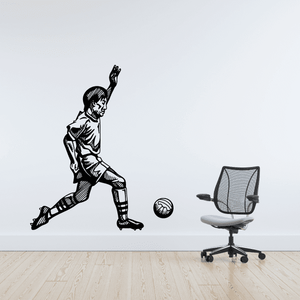Soccer wall vinyl decal of a kicking player with a soccer ball, black and white
