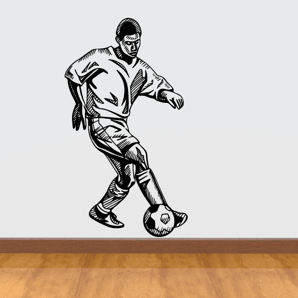 Soccer player wall decal, black vinyl silhouette of a kicking soccer player