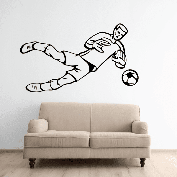 Soccer wall decal of a player kicking a soccer ball, black-and-white vinyl outline