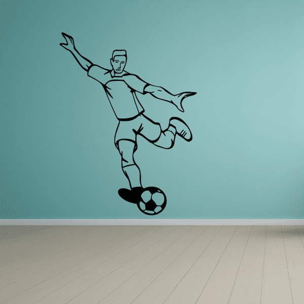 Soccer player wall vinyl decal, kicking ball with raised arms and legs