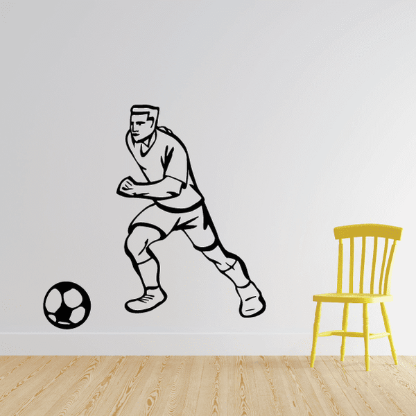 Soccer wall decal of standing player and soccer ball