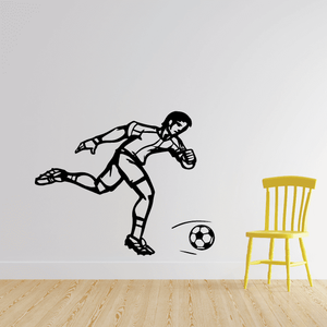 Vinyl soccer wall decal of a player kicking a ball near a soccer ball icon