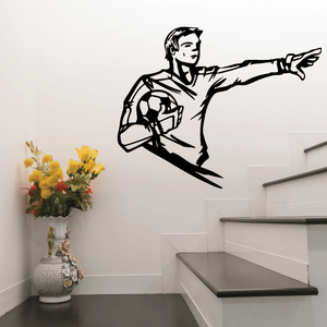Soccer wall decal of black player kicking a soccer ball