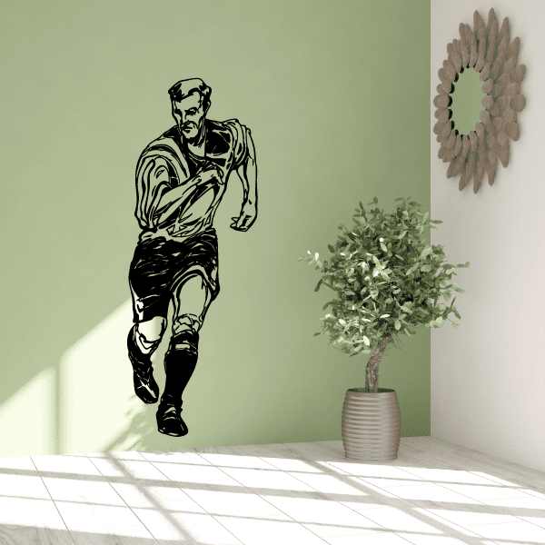 Soccer vinyl wall decal of a black running soccer player silhouette