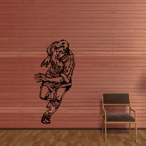 Soccer wall decal of a kneeling soccer player in black silhouette.