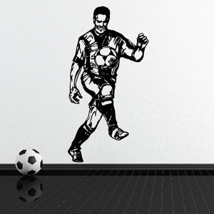 Soccer wall decal vinyl of black soccer player with ball and clenched fist