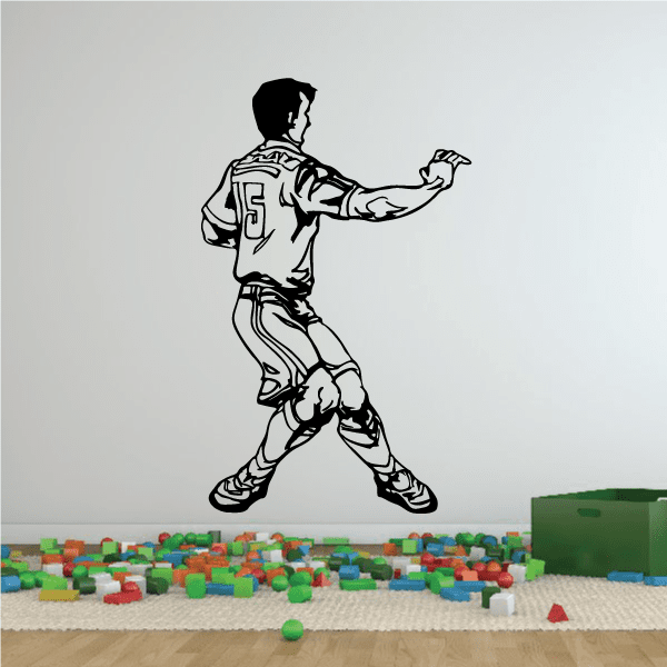 Soccer player vinyl wall decal with black outline, running pose