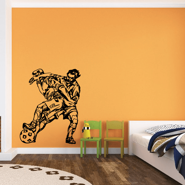 Soccer wall decal featuring a soccer player and a ball