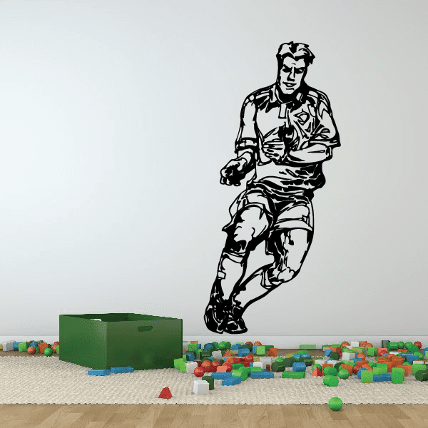 Black soccer player vinyl wall decal silhouette, dribbling ball