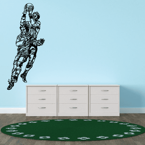 Soccer player vinyl wall decal, black outline figure in action pose