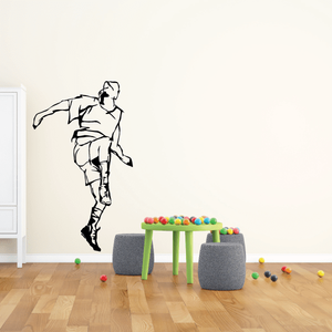 Soccer wall decal vinyl of a black soccer player silhouette in motion