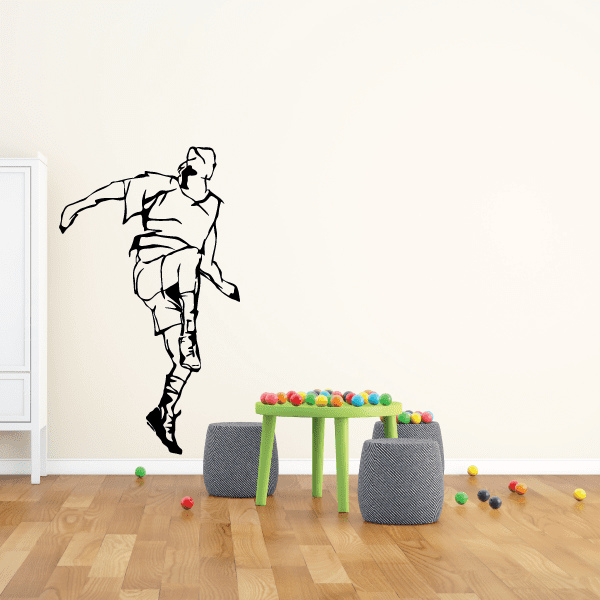 Soccer wall decal vinyl of a black soccer player silhouette in motion