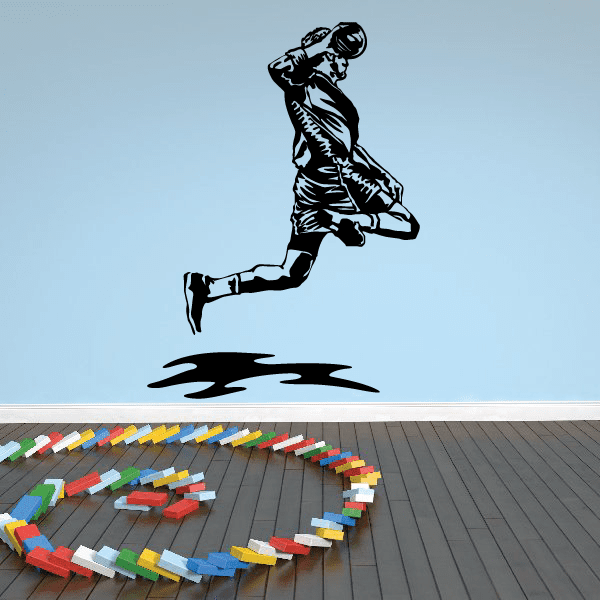 Soccer wall vinyl decal of a black soccer player kicking with ball trail
