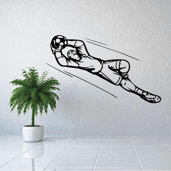Black soccer wall decal of player kicking a ball, vinyl