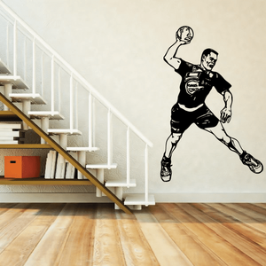 Soccer player wall decal, black vinyl silhouette of a kicking player