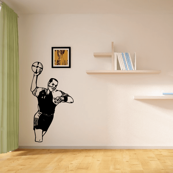 Soccer wall decal vinyl of a black football player dribbling a ball