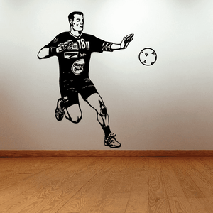 Soccer player vinyl wall decal, black silhouette with ball graphic and number 18