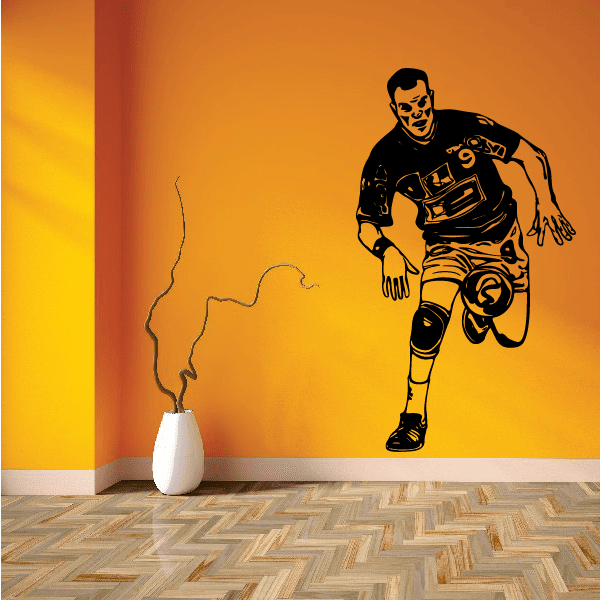 Soccer wall vinyl decal: black running soccer player silhouette