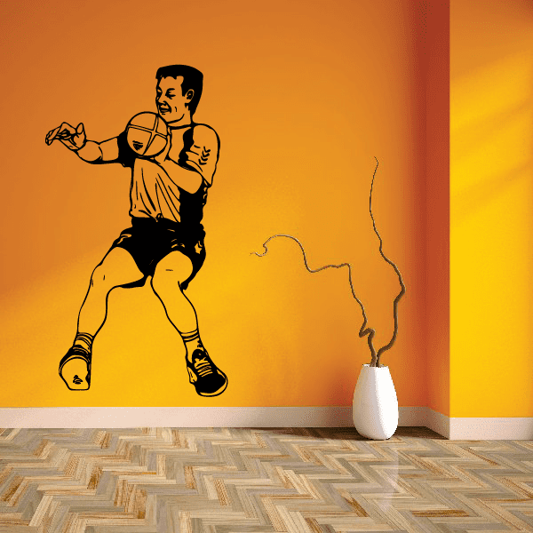 Soccer wall decal vinyl of a black soccer player kicking a ball