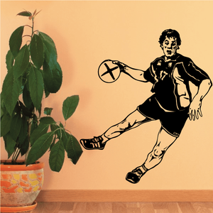 Soccer player wall decal vinyl sticker in black and white kicking ball