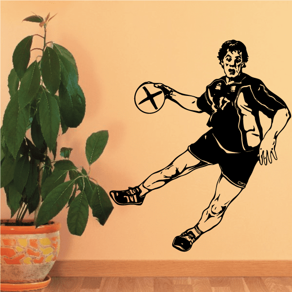 Soccer player wall decal vinyl sticker in black and white kicking ball