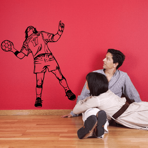 Soccer wall decal vinyl with black soccer player and ball silhouette