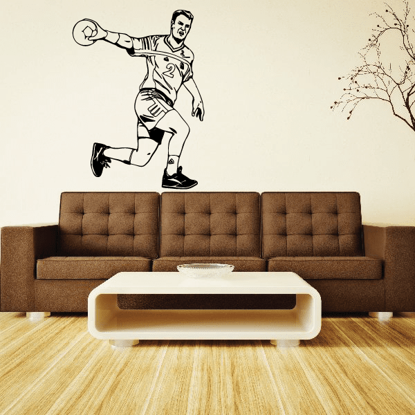 Black soccer player wall decal vinyl sticker, running and kicking pose