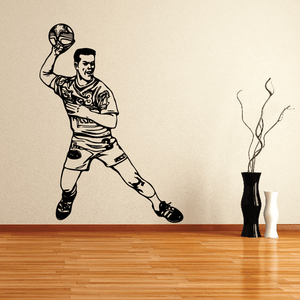Black soccer player wall decal with raised ball and kicking stance