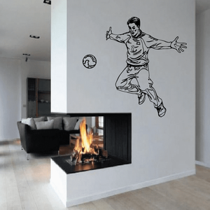 Soccer wall vinyl decal featuring a running player silhouette and ball