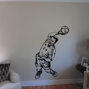 Black vinyl soccer player wall decal with ball, cartoon outline style