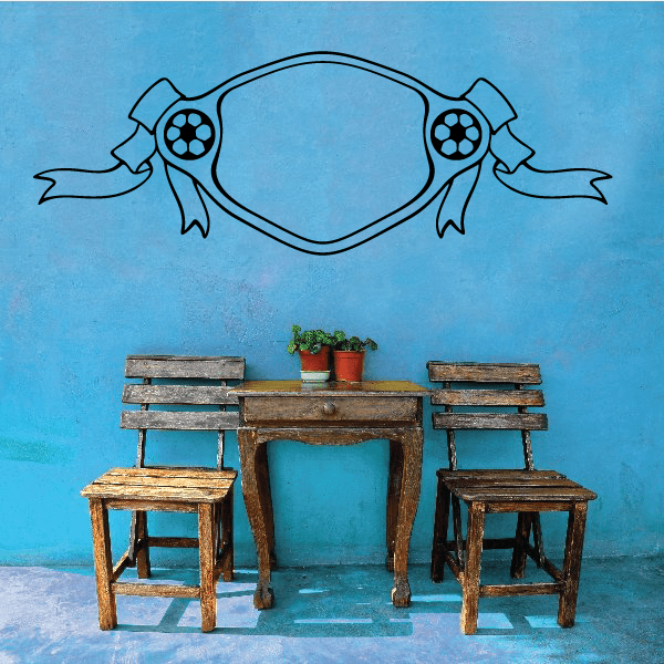 Soccer wall decal: black outline heart with two soccer ball emblems and ribbons