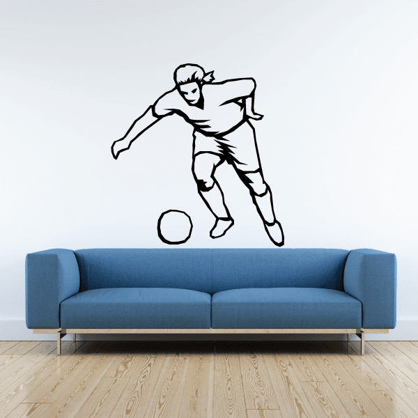 Soccer wall decal: black and white soccer player kicking a ball