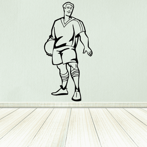 Soccer wall decal: black-and-white line-art soccer player in uniform