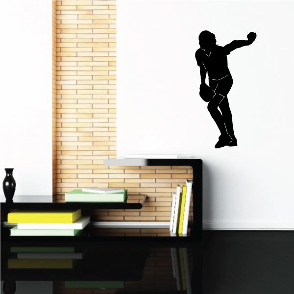 Softball pitcher decal, black silhouette of a pitching player
