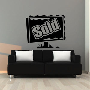 Vinyl wall decal reading “Sold” with decorative border and starburst accents
