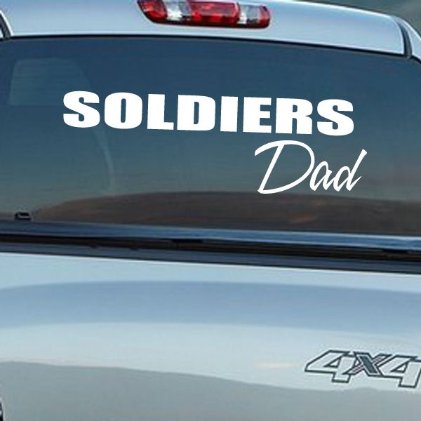 Car window decal reading 'SOLDIERS' and 'Dad' in white