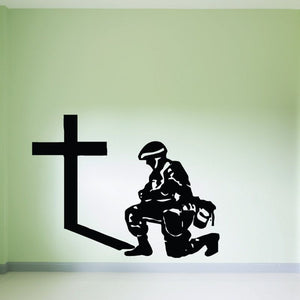 Soldier praying at cross wall decal, black silhouette