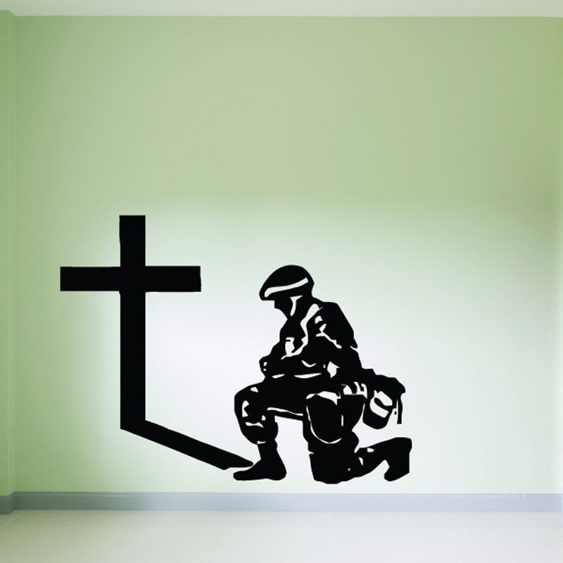 Soldier praying at cross wall decal, black silhouette